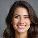 Professional portrait of Emily Rodriguez, a satisfied client